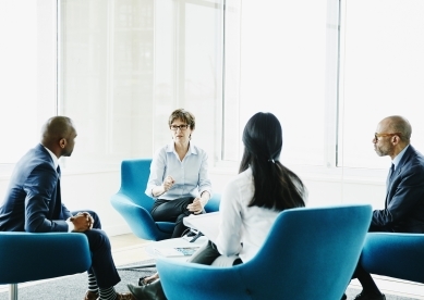 Team meeting in small conference room