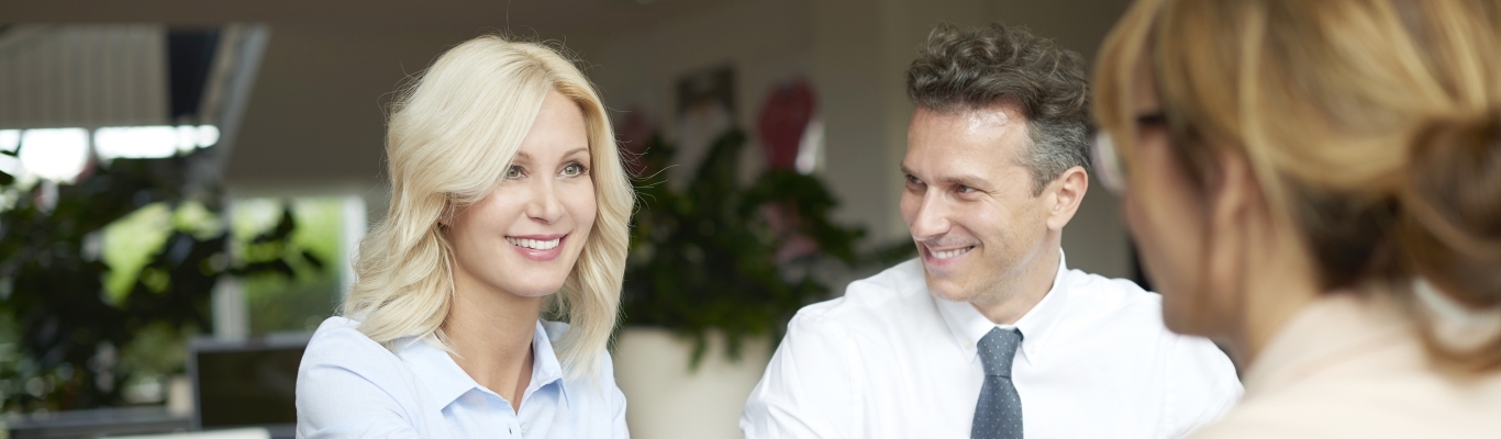 Couple Meeting with Female Advisor