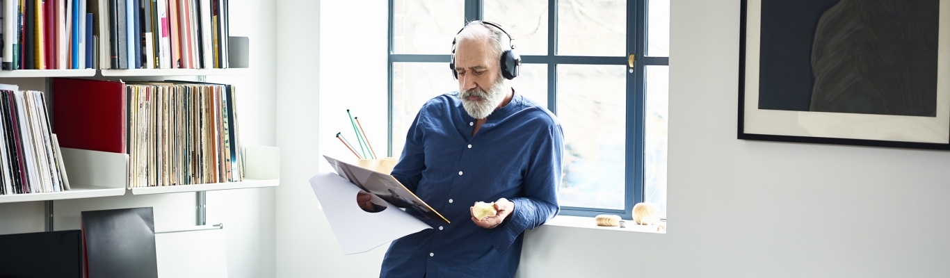 Man Looking at Records