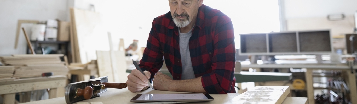 Man in woodworking studio