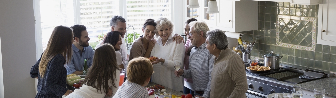 Large Family Gathered in Kitchen